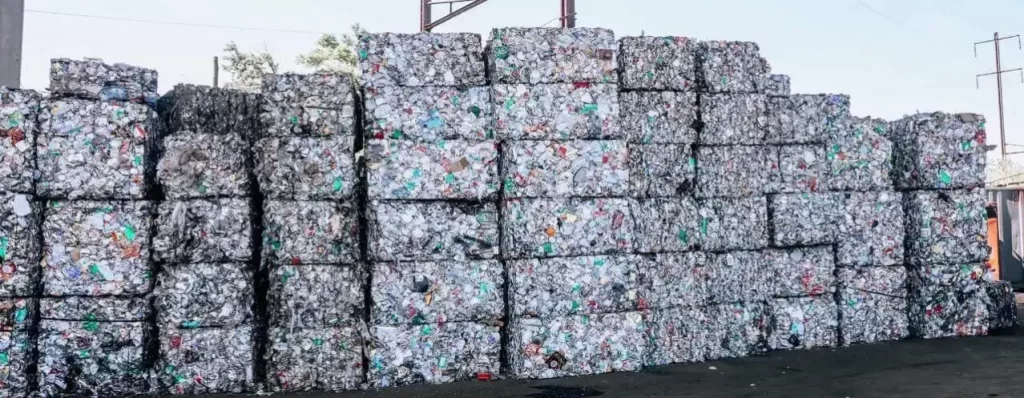 stack of scrap metal compressed into bundles